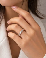 Princess-cut diamond wedding band in 18K rose gold styled on a model | SARATTI