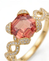 Rose Régale rubellite tourmaline ring with twisting diamond pavé design in 18K yellow gold | SARATTI