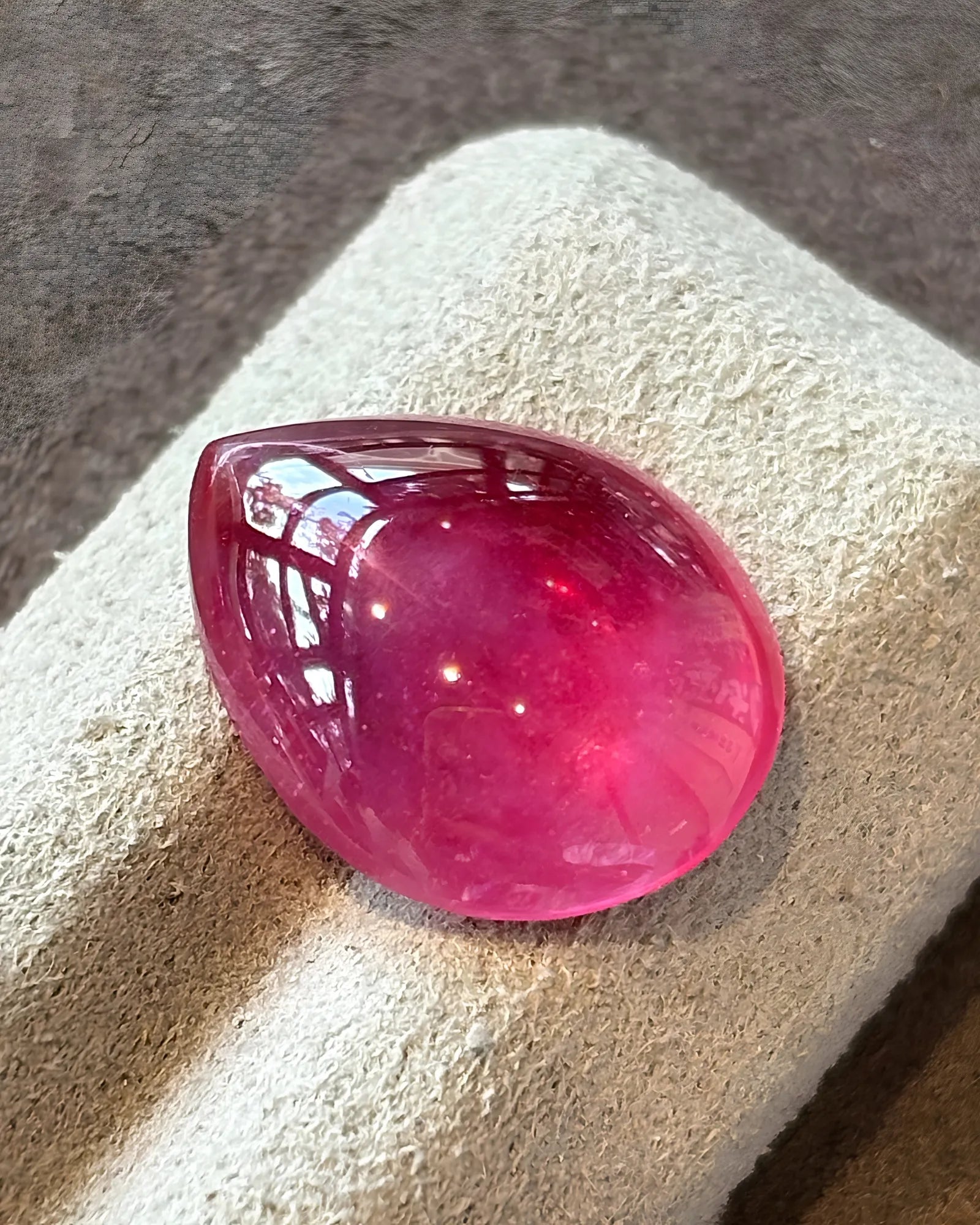 Rose Red pear cabochon Ruby polished dome detail | SARATTI