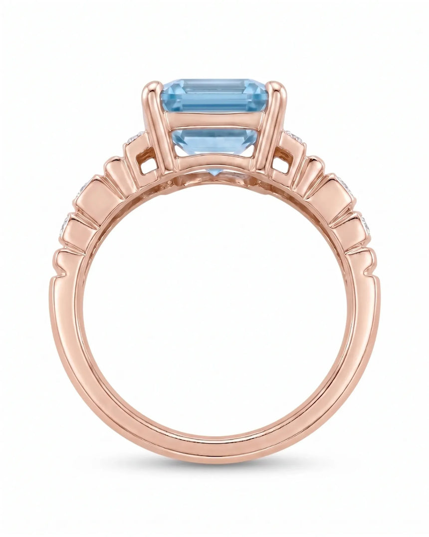 Rose gold aquamarine ring with architectural band and diamond-set shoulder design | SARATTI