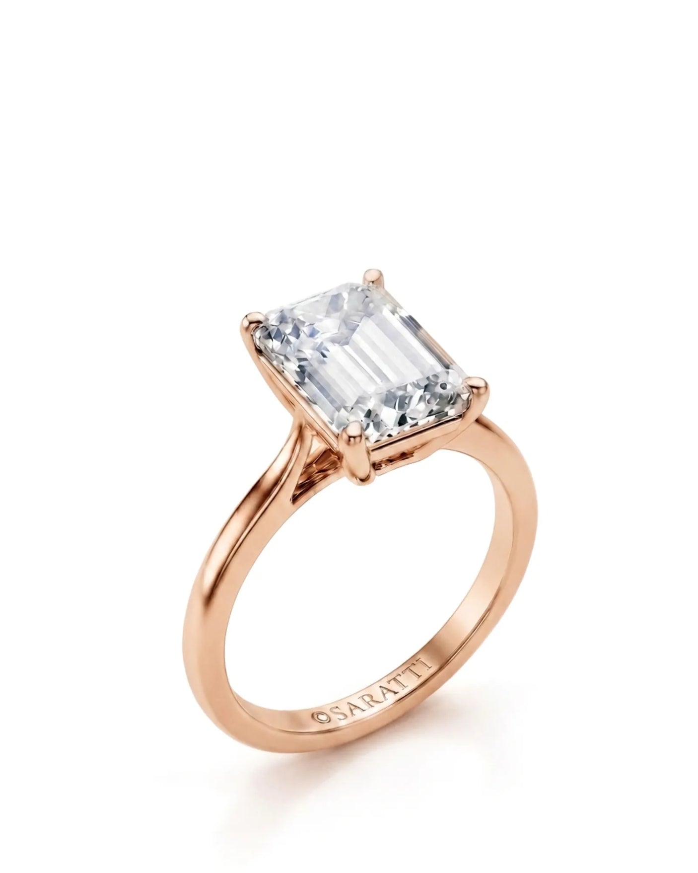Rose gold emerald-cut moissanite engagement ring with four-prong solitaire setting and polished band | SARATTI