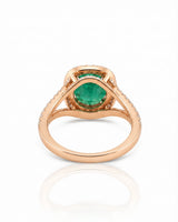 Rose gold emerald engagement ring and matching curved band for a meaningful proposal | SARATTI