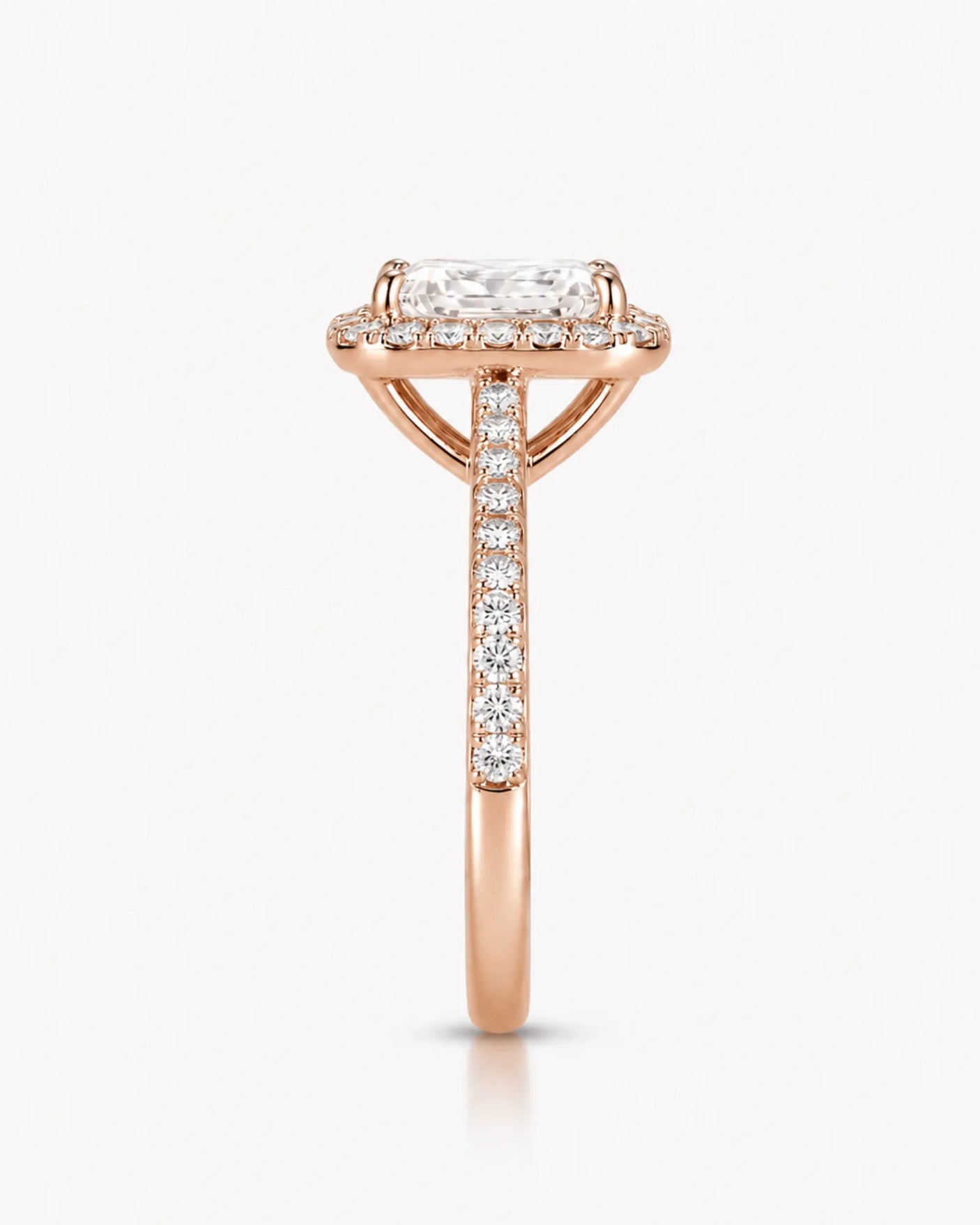Rose gold halo moissanite engagement ring created for an expressive romantic proposal | SARATTI