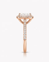 Rose gold halo moissanite engagement ring created for an expressive romantic proposal | SARATTI