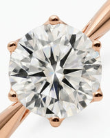 Rose gold moissanite engagement ring for a classic romantic proposal | SARATTI