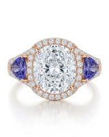 Rose gold moissanite ring with cushion center, halo, and tanzanite accents | SARATTI