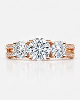 Rose gold moissanite ring with pavé shoulders, open gallery, and hidden round accent | SARATTI