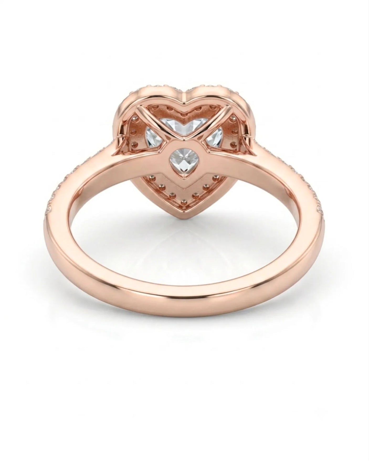 Rose gold moissanite ring with romantic heart design and round side stones | SARATTI