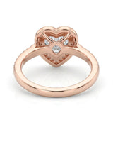 Rose gold moissanite ring with romantic heart design and round side stones | SARATTI