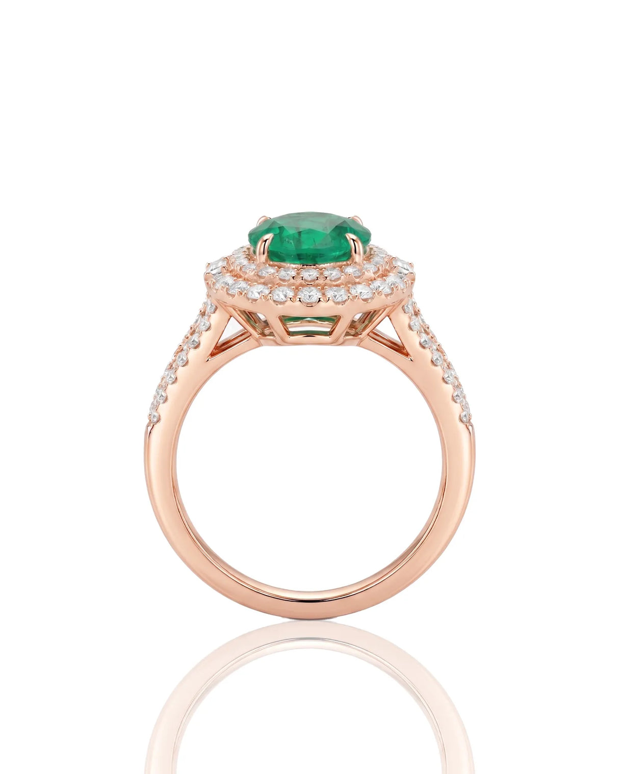 Rose gold oval emerald ring with round and baguette diamond accents | SARATTI
