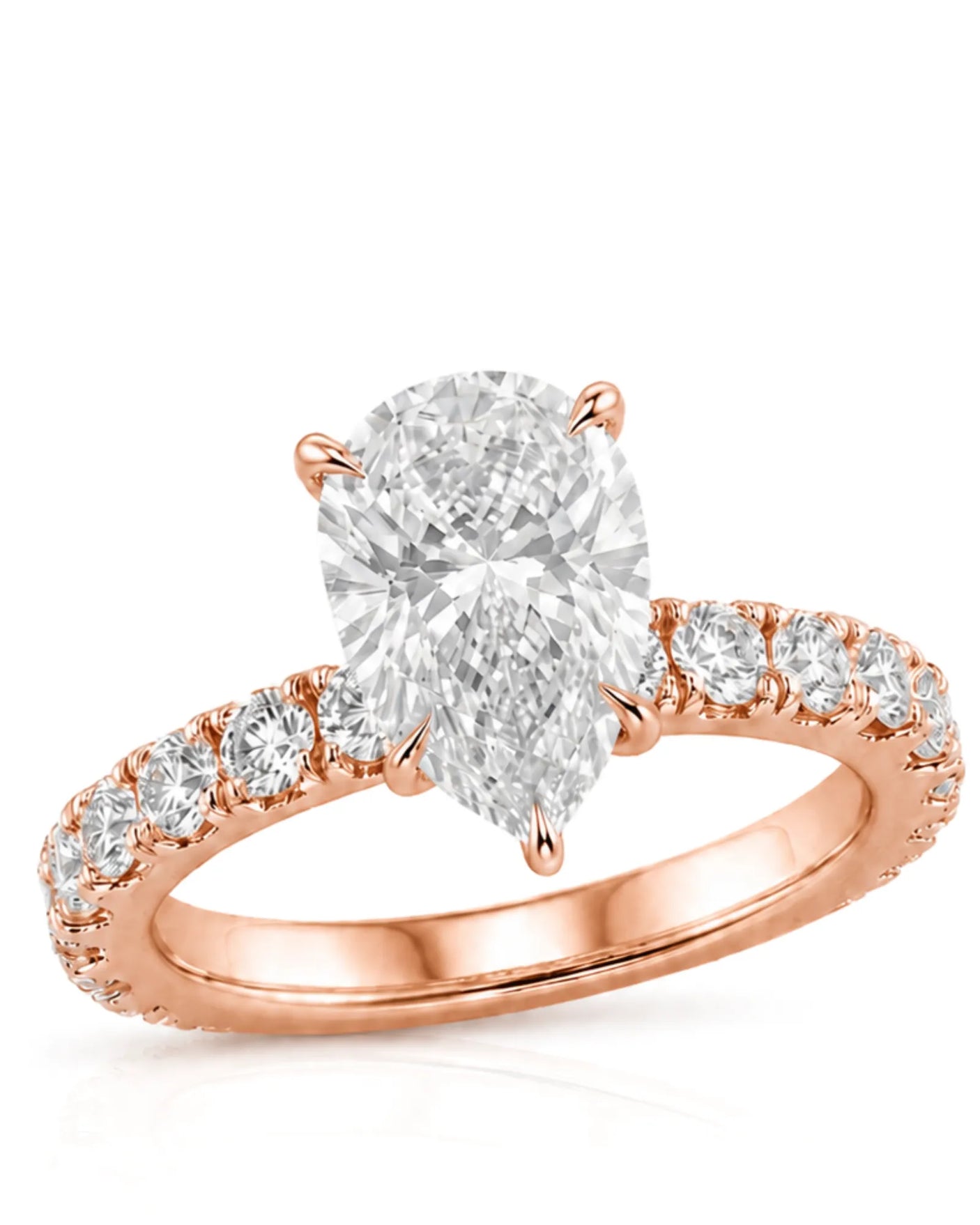 Rose gold pear cut moissanite engagement ring with round side stones and slim polished band | SARATTI