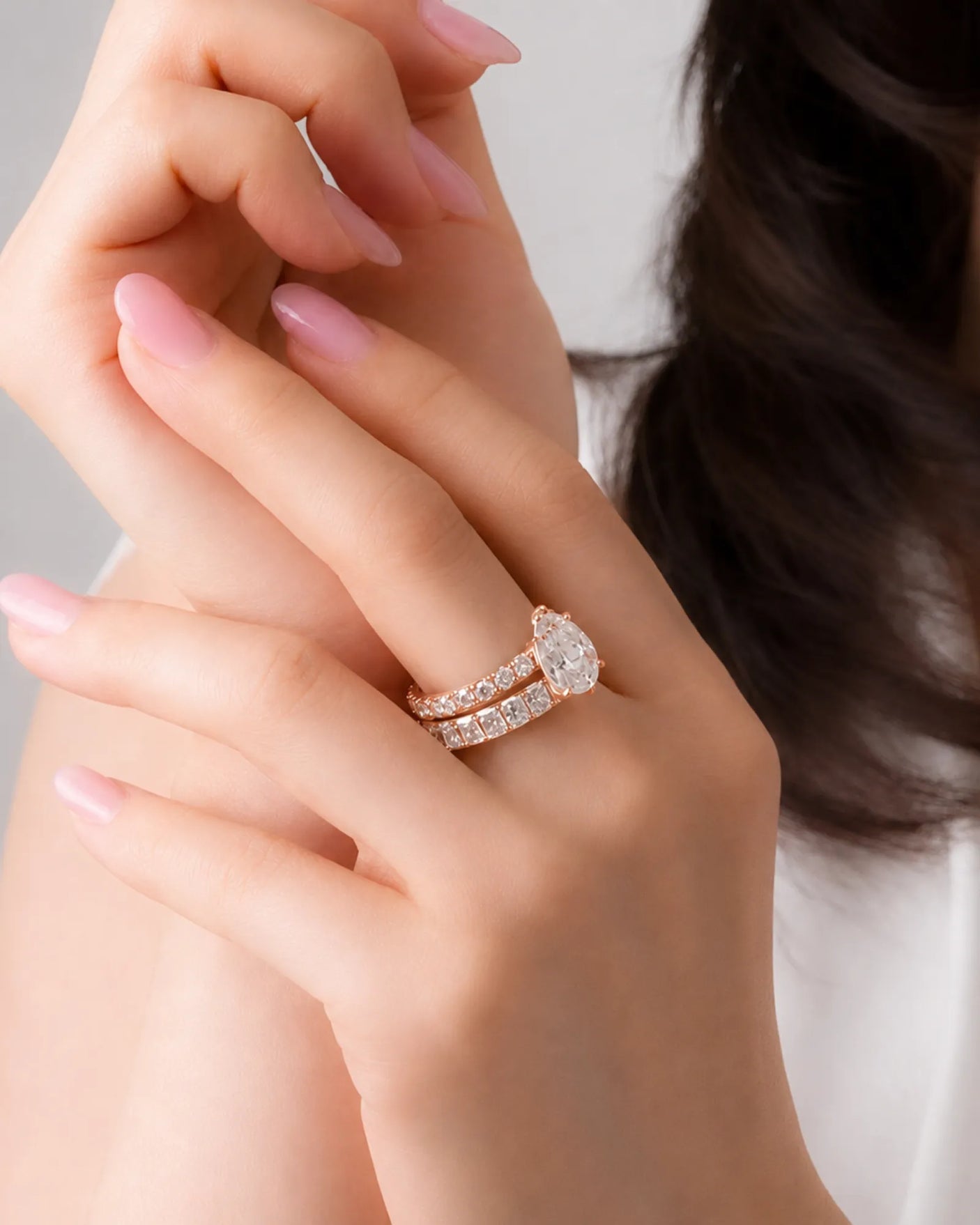 Rose gold pear shaped moissanite ring for a romantic and refined engagement look | SARATTI.