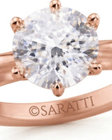 Rose gold round moissanite engagement ring for an elegant and romantic proposal | SARATTI.
