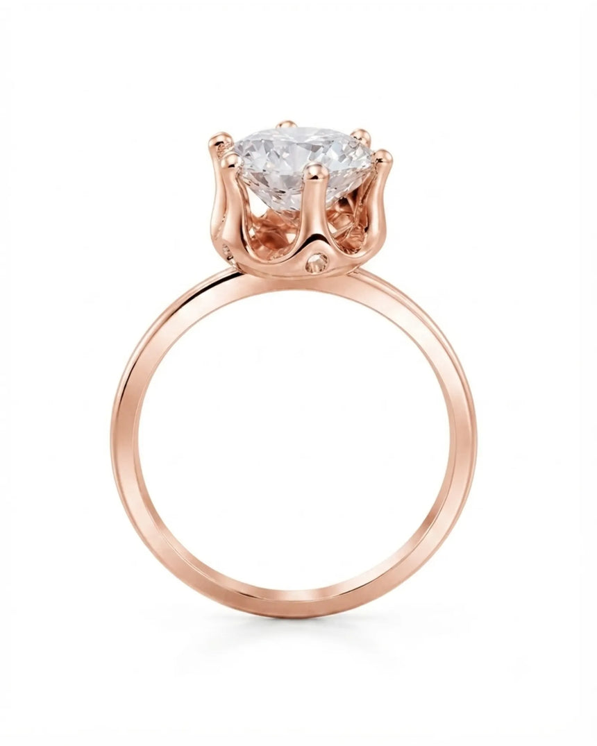 Rose gold round moissanite engagement ring for an elegant and romantic proposal | SARATTI