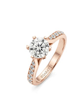 Rose gold round moissanite engagement ring with six-prong crown and pavé shoulders | SARATTI