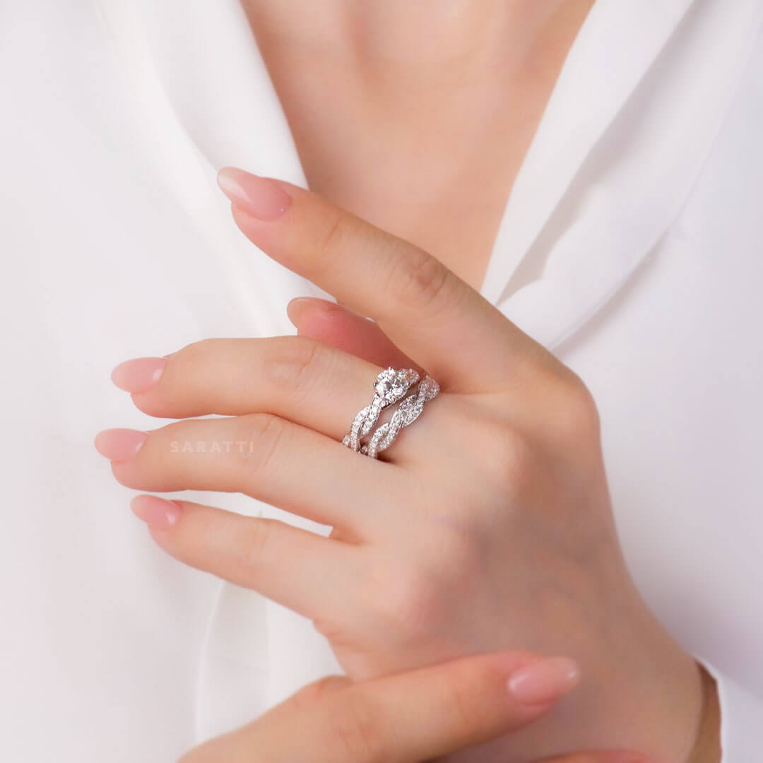 Model sporting the Twisted Shank White Gold Floating Diamond Eternity Ring Bridal Set | Saratti