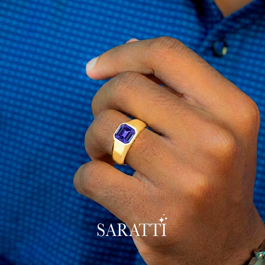 Mens tanzanite ring worn on hand in 18K yellow gold | SARATTI