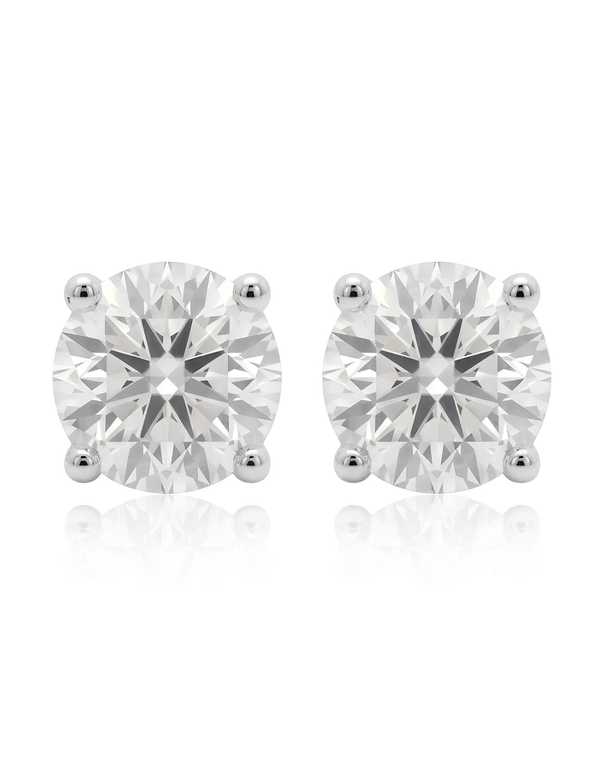 1.00 ct. tw. lab-grown round diamond four-prong studs in 14K white gold, prong detail | SARATTI