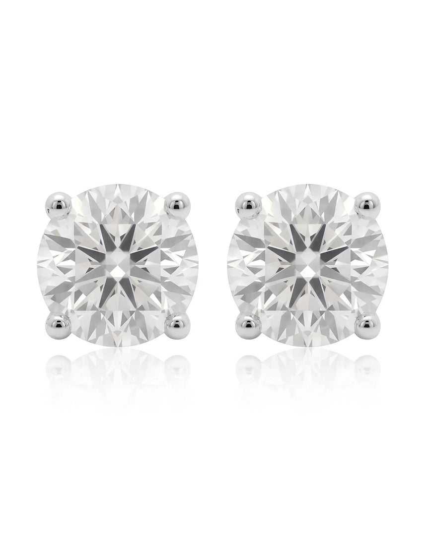 3.00 ct. tw. lab-grown round diamond four-prong studs in platinum, prong detail | SARATTI