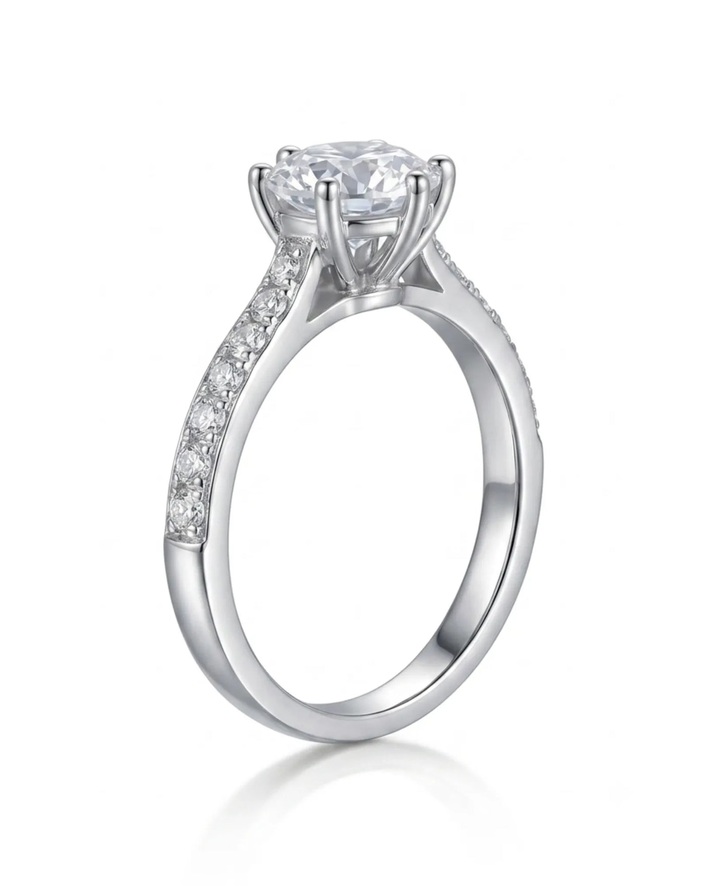 Round centre diamond ring with elevated basket setting and refined platinum pavé band | SARATTI