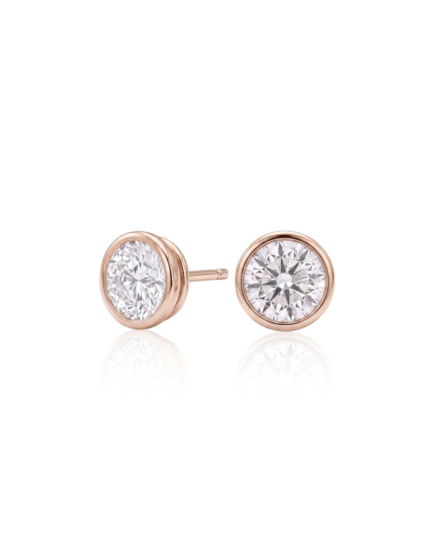 1.00 ct. tw. lab-grown round diamond full-bezel stud earrings in 14K rose gold, front view | SARATTI
