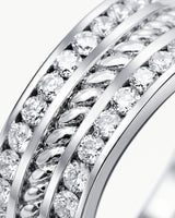 Round diamond wedding band with structured channels and polished 18K white gold | SARATTI