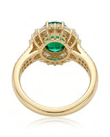Round emerald ring with baguette diamonds in 18K yellow gold | SARATTI

