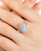 Round moissanite bridal set in platinum with halo engagement ring and matching curved wedding band | SARATTI