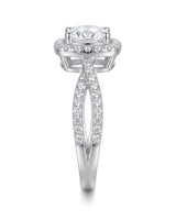 Round moissanite center stone ring with halo side stones in platinum | SARATTI