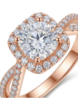 Round moissanite center stone ring with halo side stones in rose gold | SARATTI
