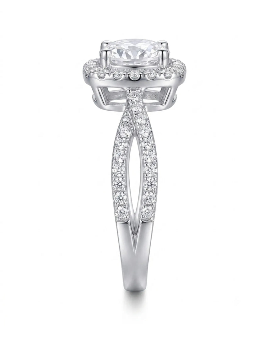Round moissanite center stone ring with halo side stones in white gold | SARATTI
