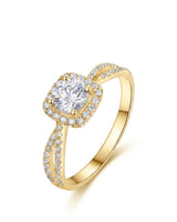 Round moissanite engagement ring with cushion halo and split shank in yellow gold | SARATTI