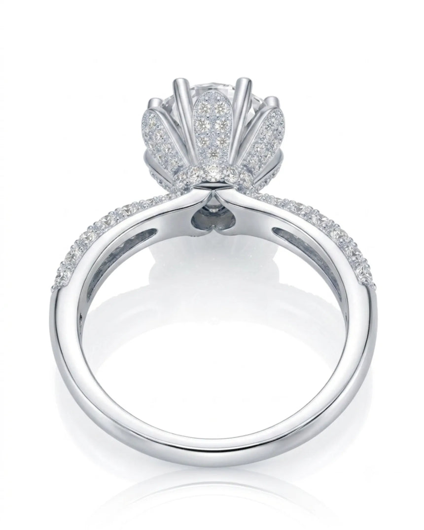 Round moissanite engagement ring with flower-inspired setting and pavé shoulders crafted in polished platinum - SARATTI