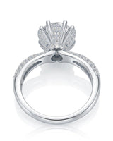 Round moissanite engagement ring with flower-inspired setting and pavé shoulders in polished 18K white gold | SARATTI