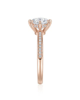 Round moissanite engagement ring with pavé band in romantic rose gold | SARATTI