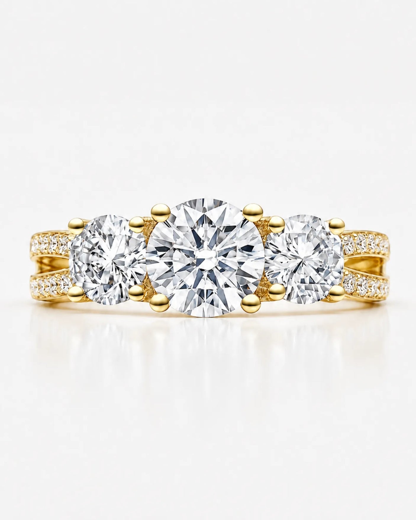 Round moissanite engagement ring with warm yellow gold setting and discreet gallery accent | SARATTI
