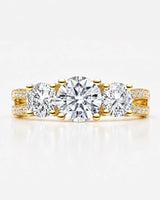 Round moissanite engagement ring with warm yellow gold setting and discreet gallery accent | SARATTI