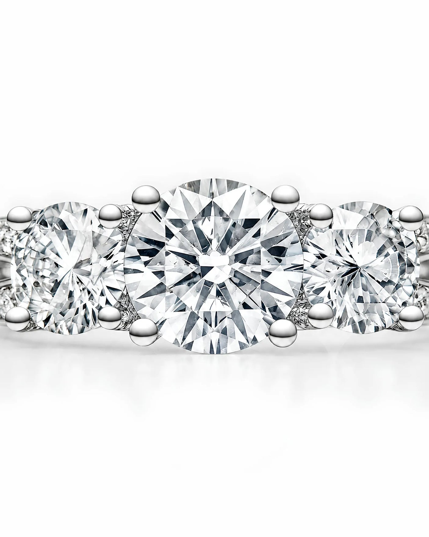 Round moissanite platinum ring featuring side stones, pavé shoulders, and gallery accent | SARATTI