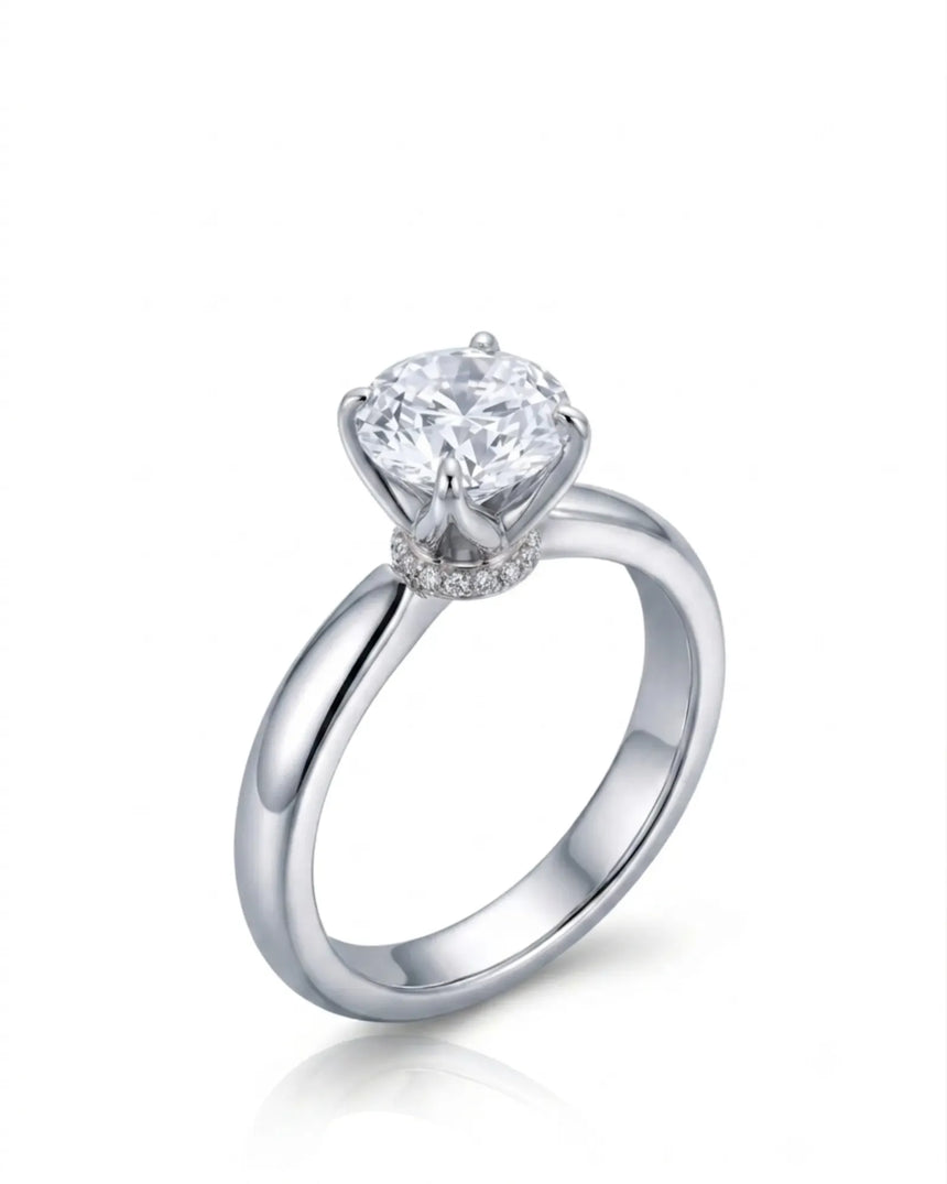Round moissanite promise ring with tulip prongs and hidden pavé detail crafted in 18k white gold | SARATTI