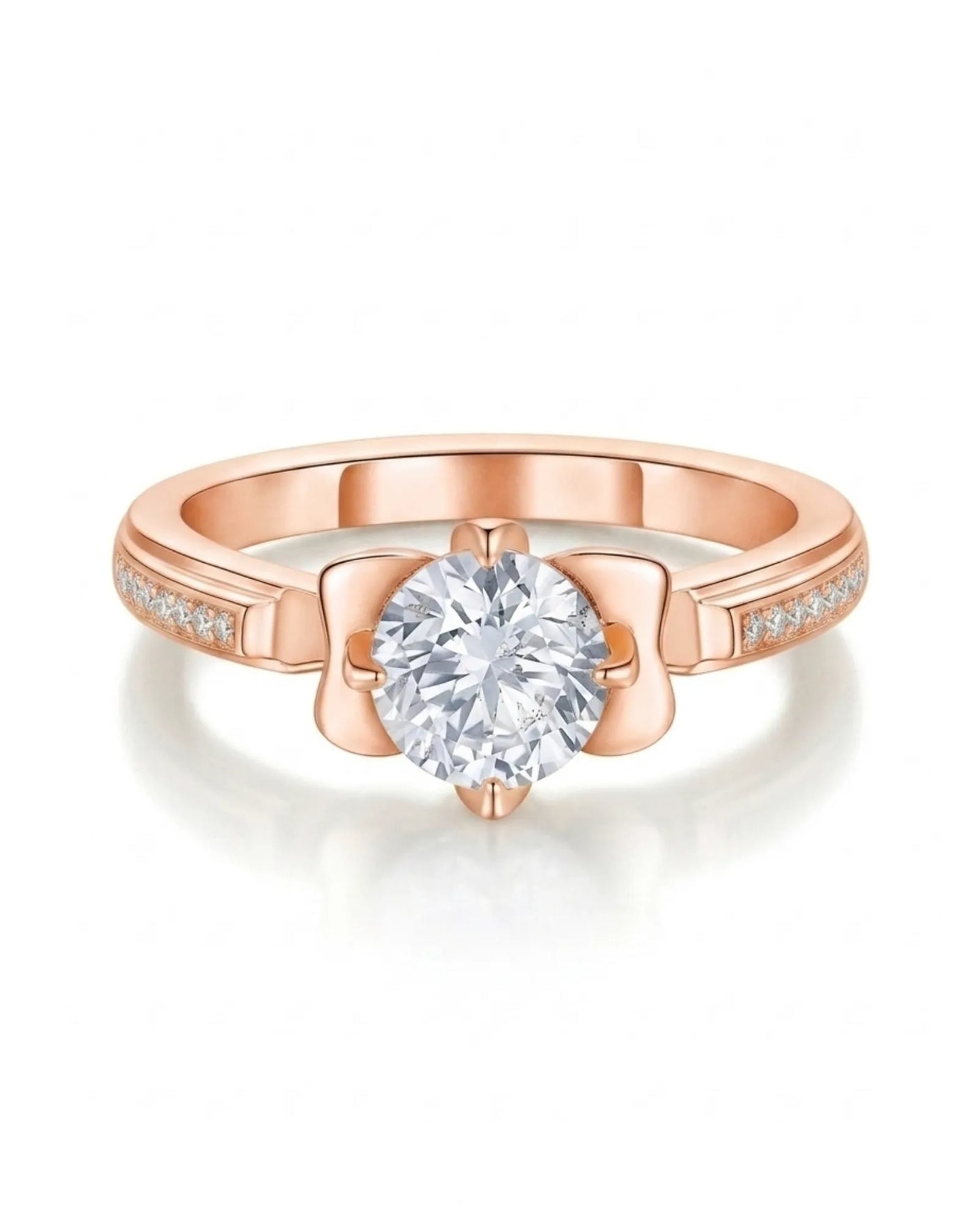 Round moissanite proposal ring with pavé side stones and symbolic fleur-de-lis setting in 18K rose gold | SARATTI