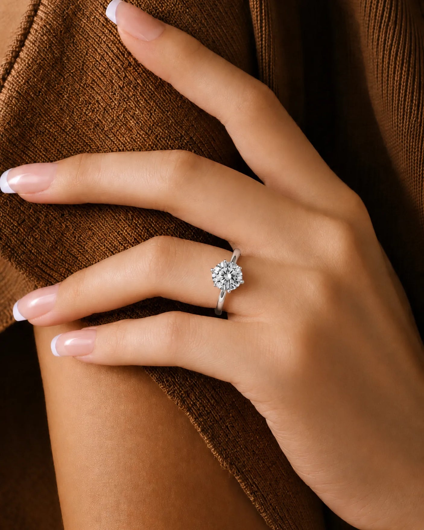 Round moissanite ring in platinum with polished band and open gallery design | SARATTI