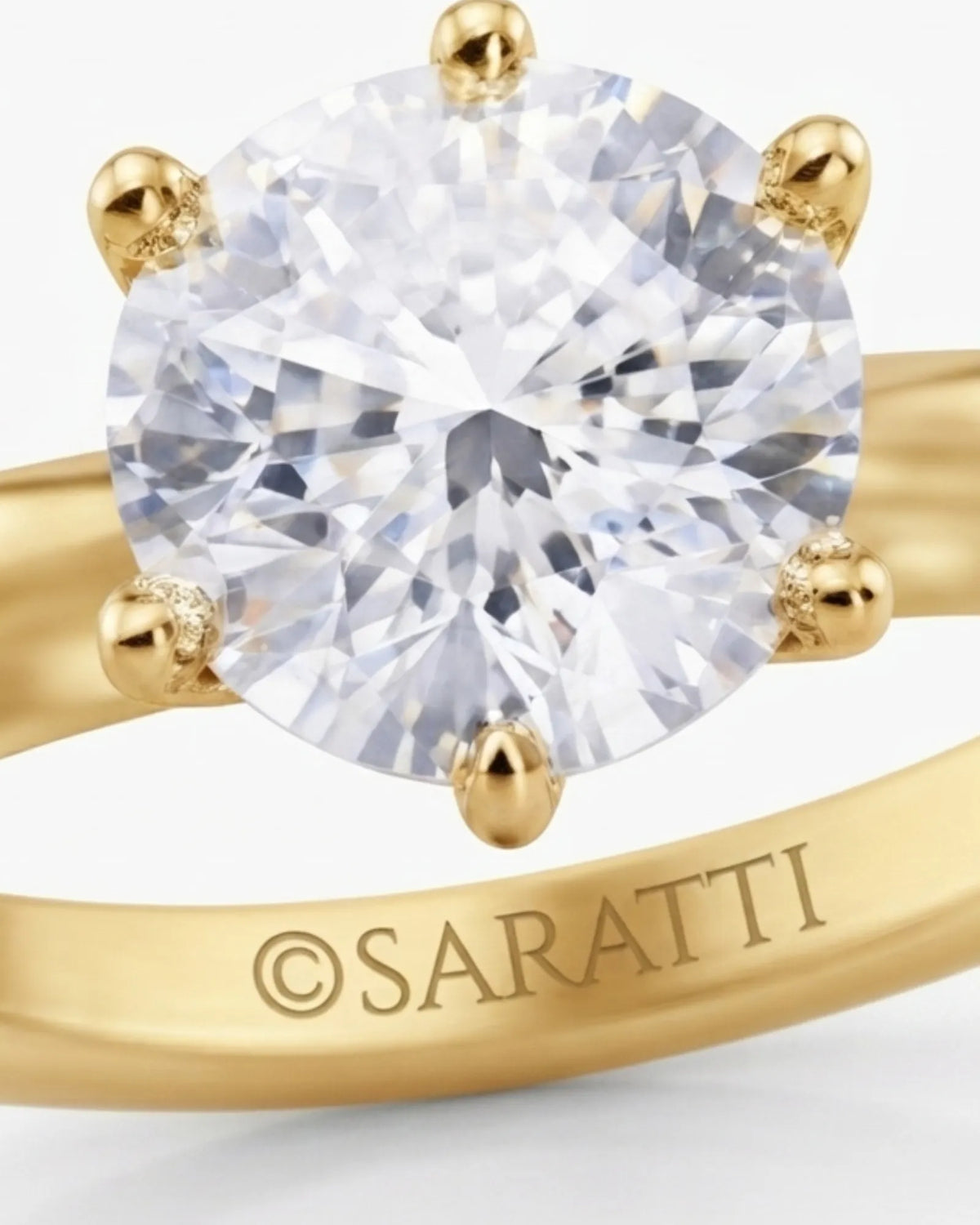 Round moissanite solitaire ring in 18K yellow gold with tulip-inspired crown and polished band | SARATTI