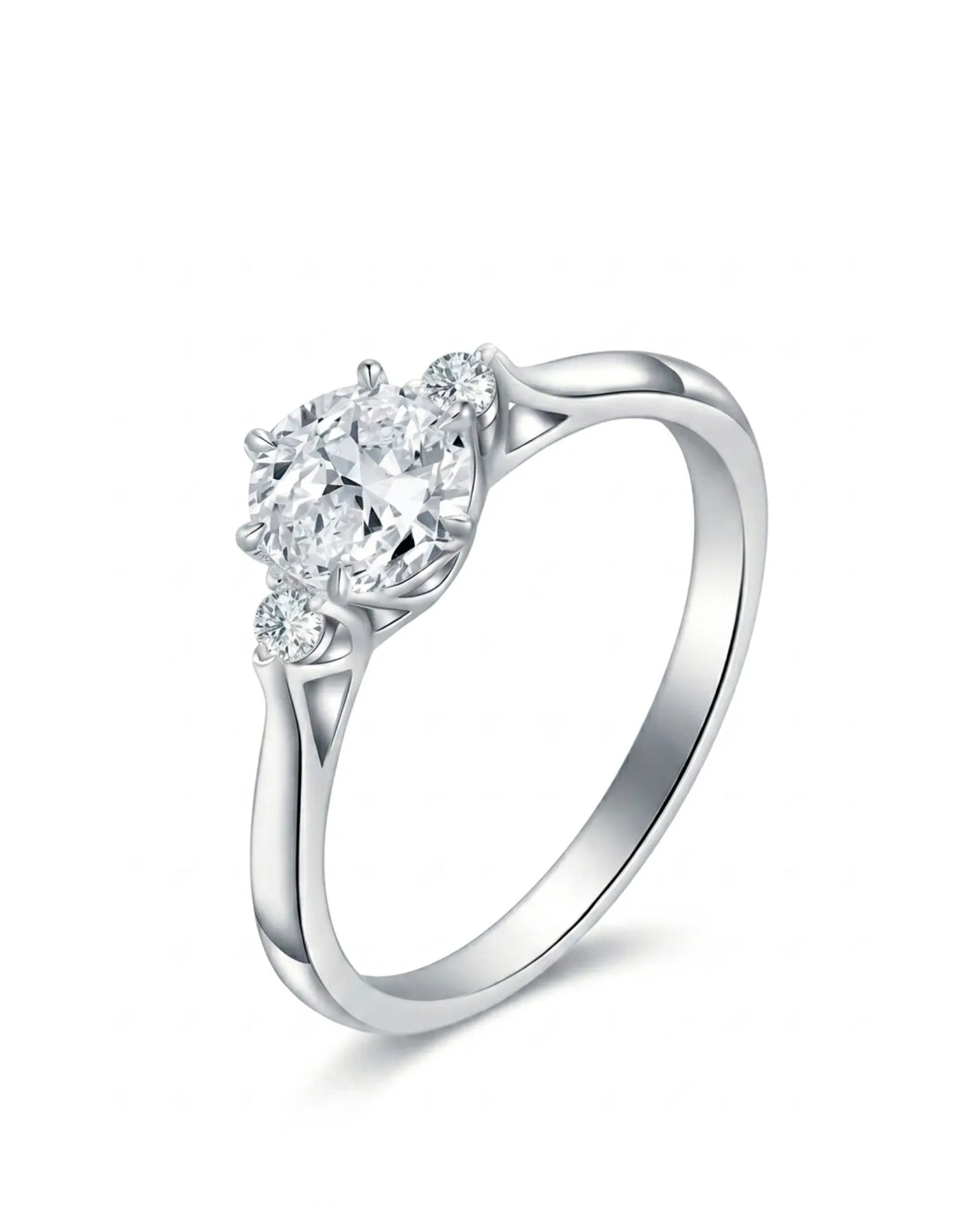 Round moissanite three stone engagement ring with sculptural white gold setting | SARATTI