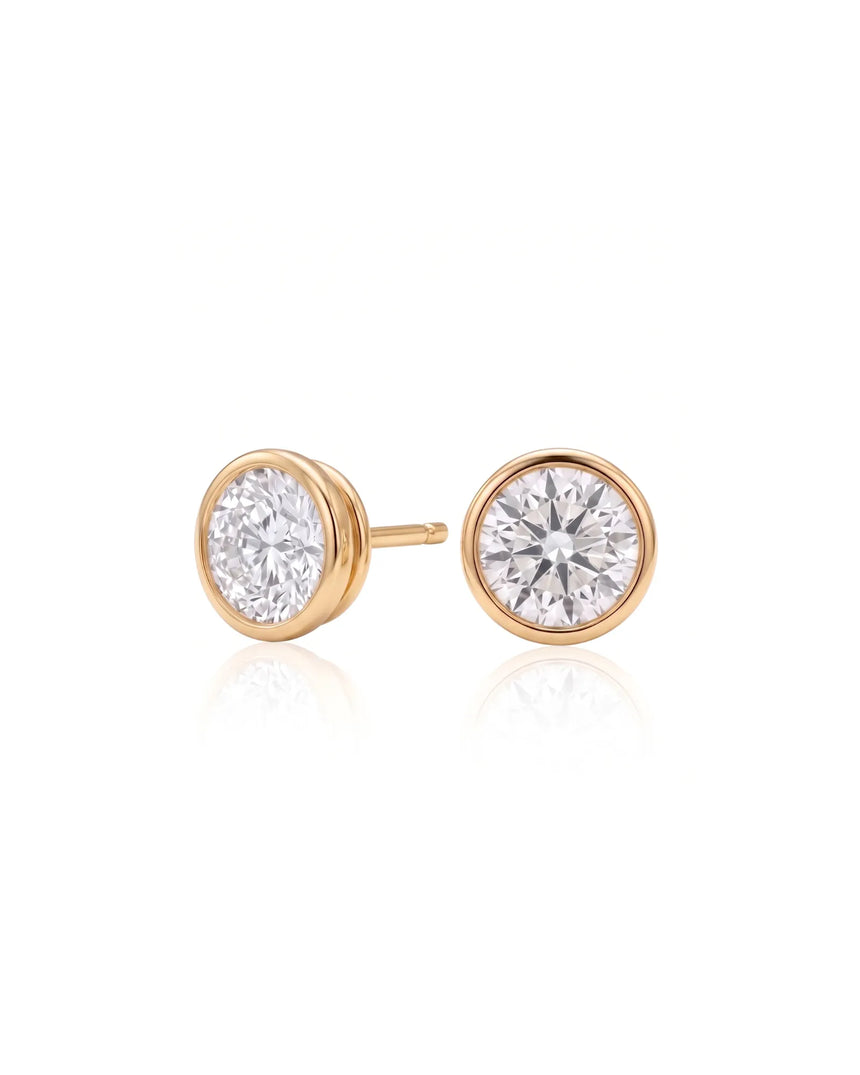 1.00 ct. tw. lab-grown round diamond full-bezel stud earrings in 14K yellow gold, front view | SARATTI