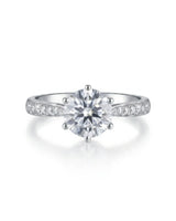 Round six prong moissanite engagement ring for a timeless proposal crafted in platinum | SARATTI