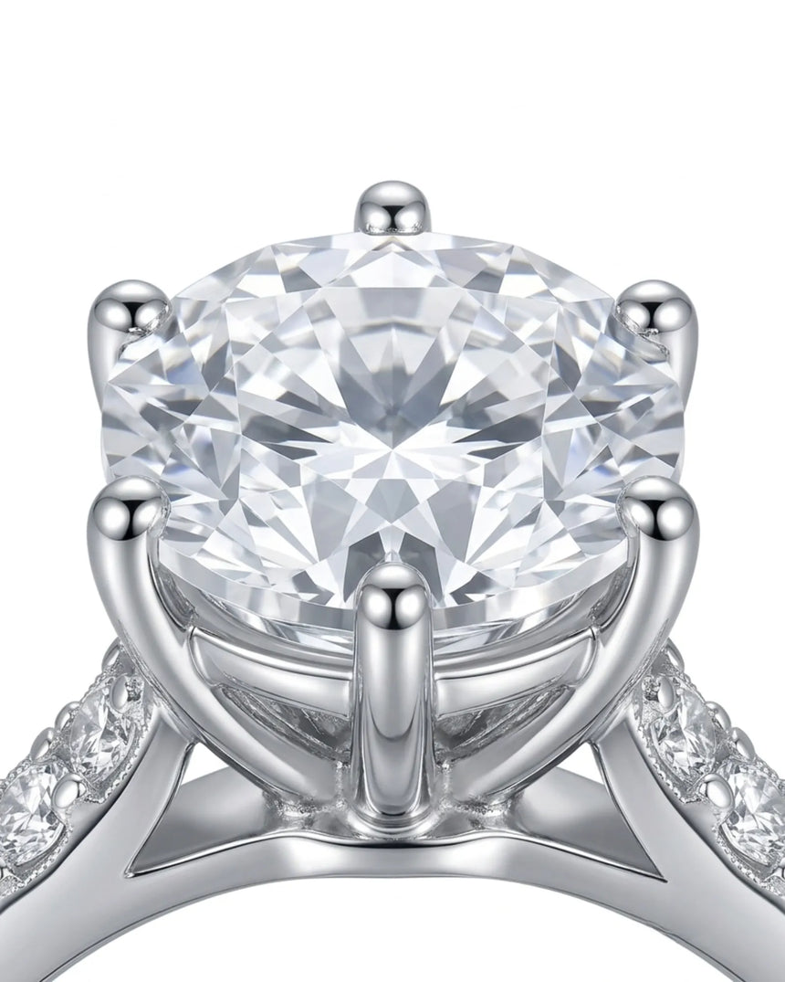 Round six prong moissanite engagement ring for a timeless proposal in white gold | SARATTI