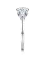 Round three stone moissanite engagement ring for a refined proposal in white gold | SARATTI