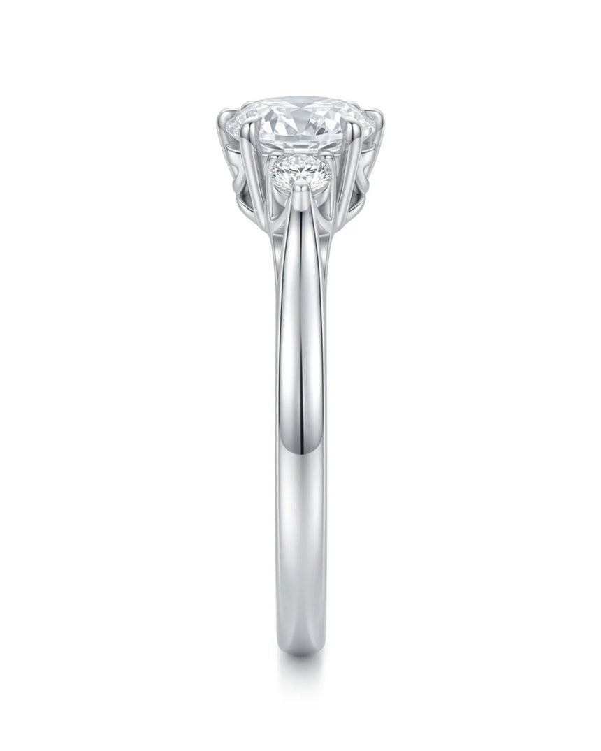 Round three stone moissanite engagement ring for a refined proposal in white gold | SARATTI