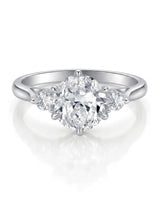 Round three stone moissanite engagement ring for a timeless proposal in platinum | SARATTI