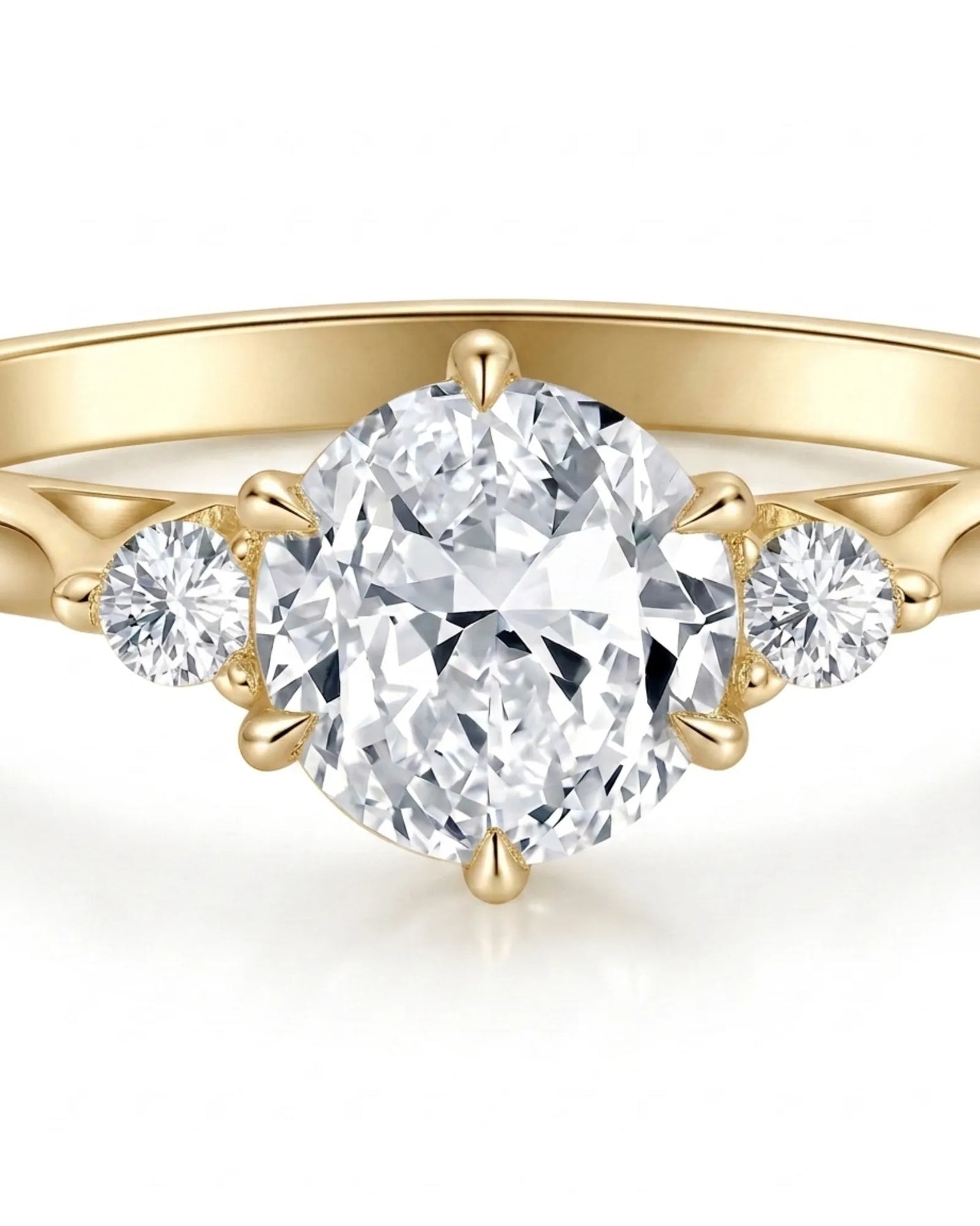 Round three stone moissanite engagement ring for a warm refined proposal in yellow gold | SARATTI